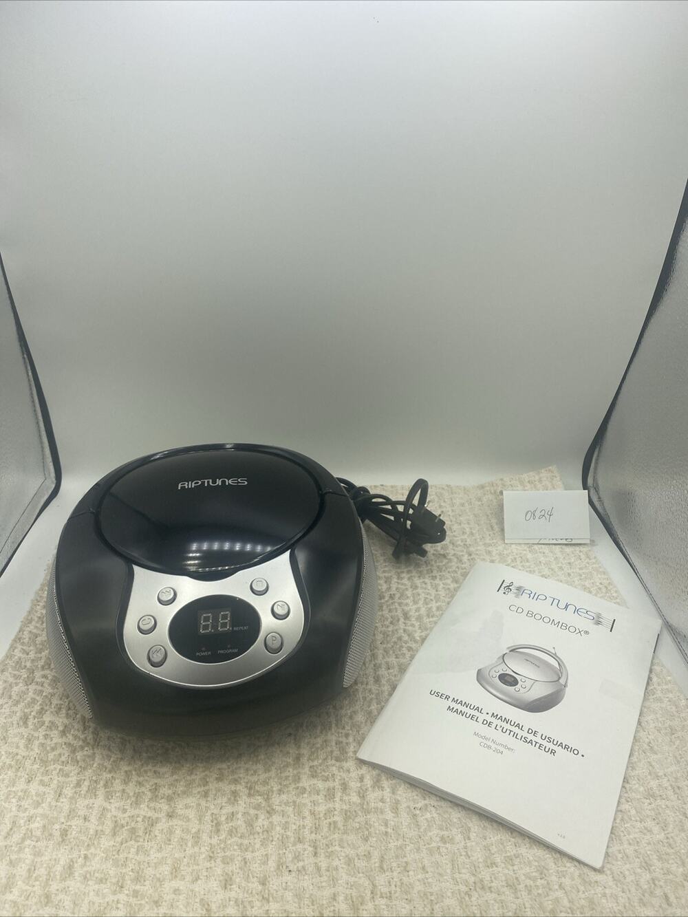 RIPTUNES Portable CD + AM/FM Radio + AUX Boombox. Model # CDB-204K
